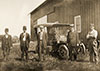 William Henry Frost, ?, ?, ?, ? with car in front of barn