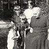 Caption from album: Jean, Grandma, Georgie, Frankie, and Junior Keller